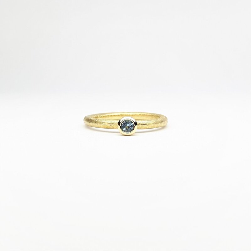 "combiring mini", or jaune 18kt et aigue-marine Ø3mm.